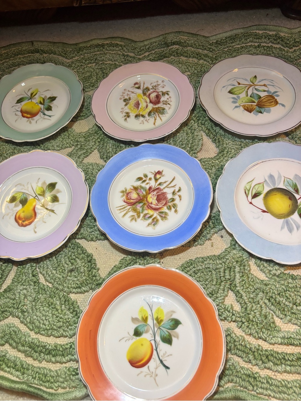 ANTIQUE HAND-PAINTED PORCELAIN FRUIT & FLORAL THEMED PLATES. SET OF 7.